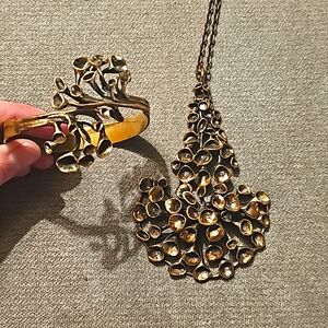 Costume necklace with adjustable matching bracelet